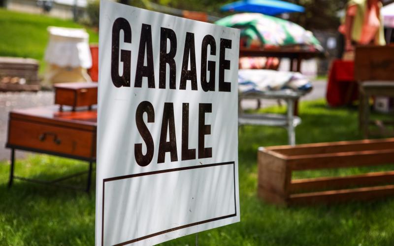 Garage Sale Sign in a yard