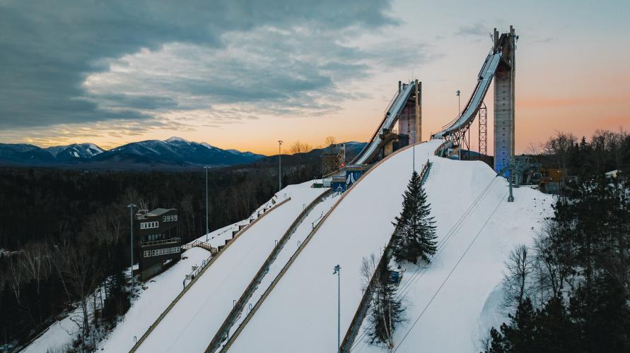 The Olympic Ski Jumps during a winter sunset.