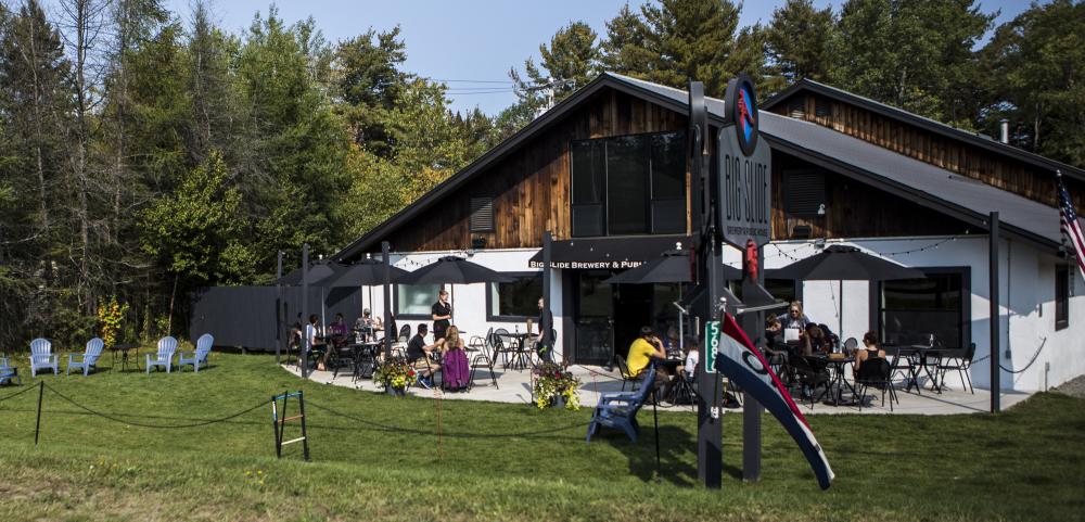 The exterior of a chalet-style brewpub.