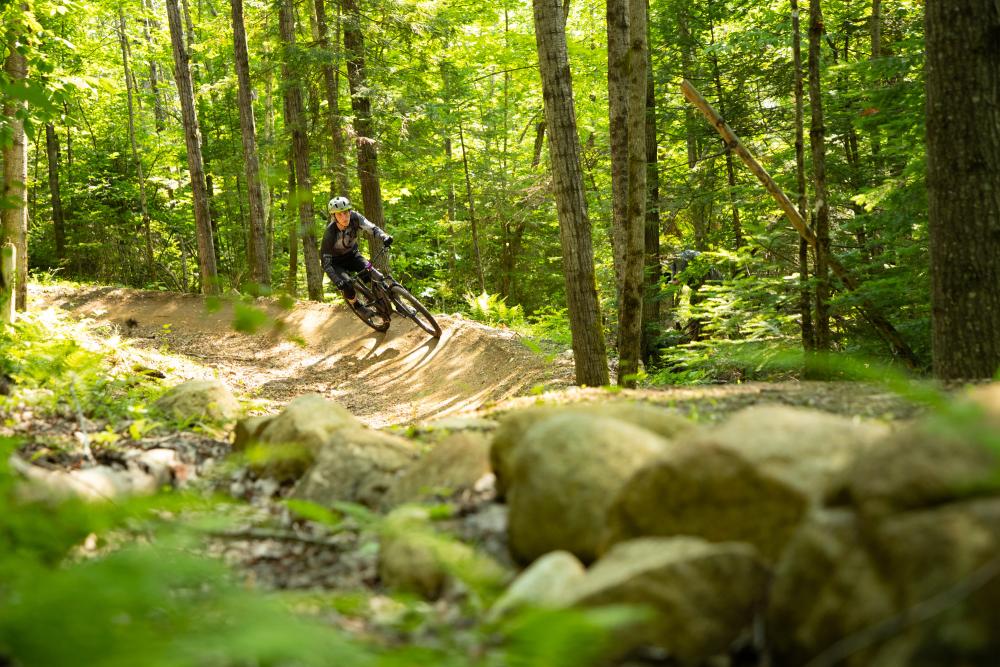 mountain biker riding a berm