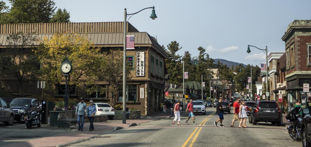 People walking along Main Street Lake Placid