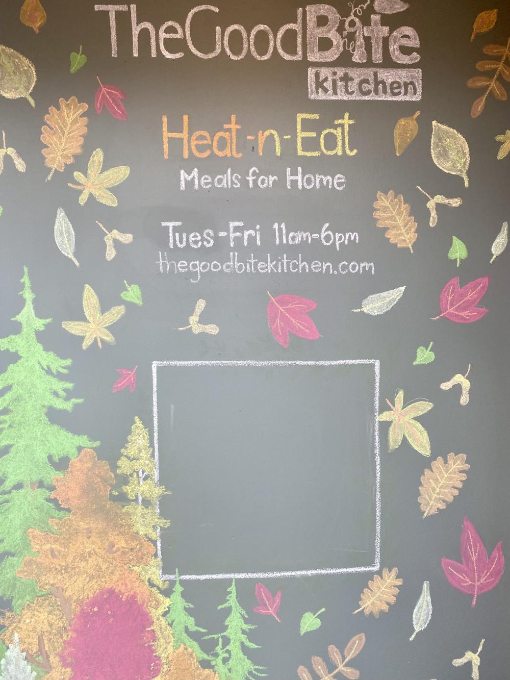 chalkboard leaf art with restaurant sign