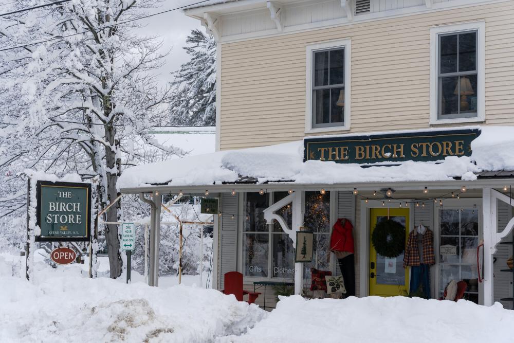 Exterior of Birch Store in winter covered in snow