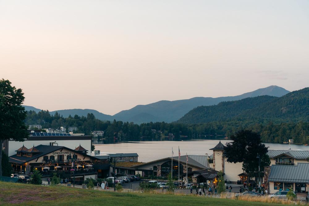 A view of Generations restaurant at sunset with Mirror Lake in the backgound.