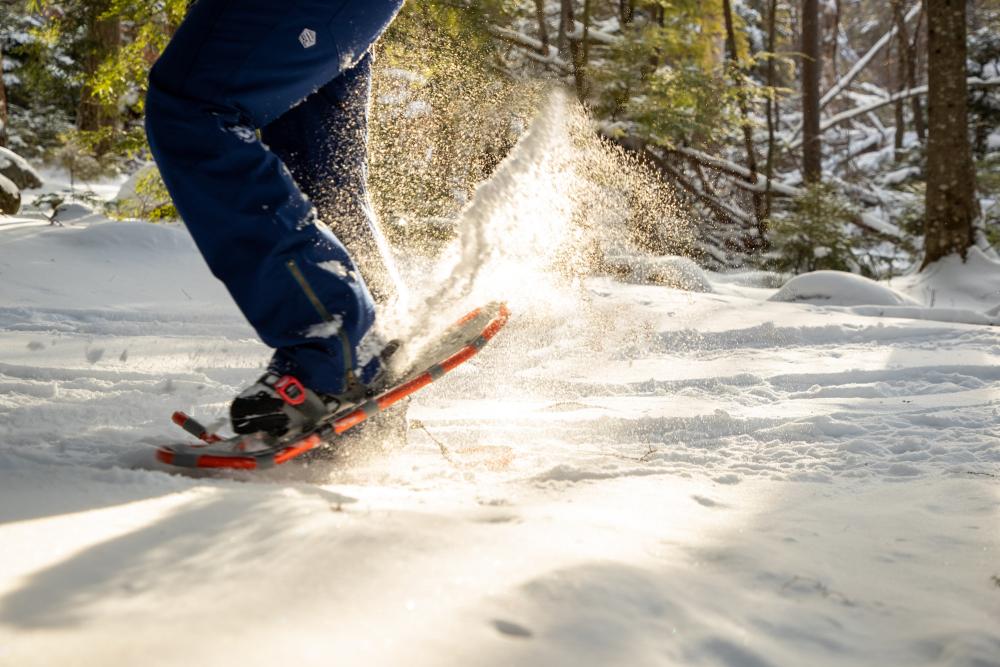 The close-up of a snowshoers' snowshoes