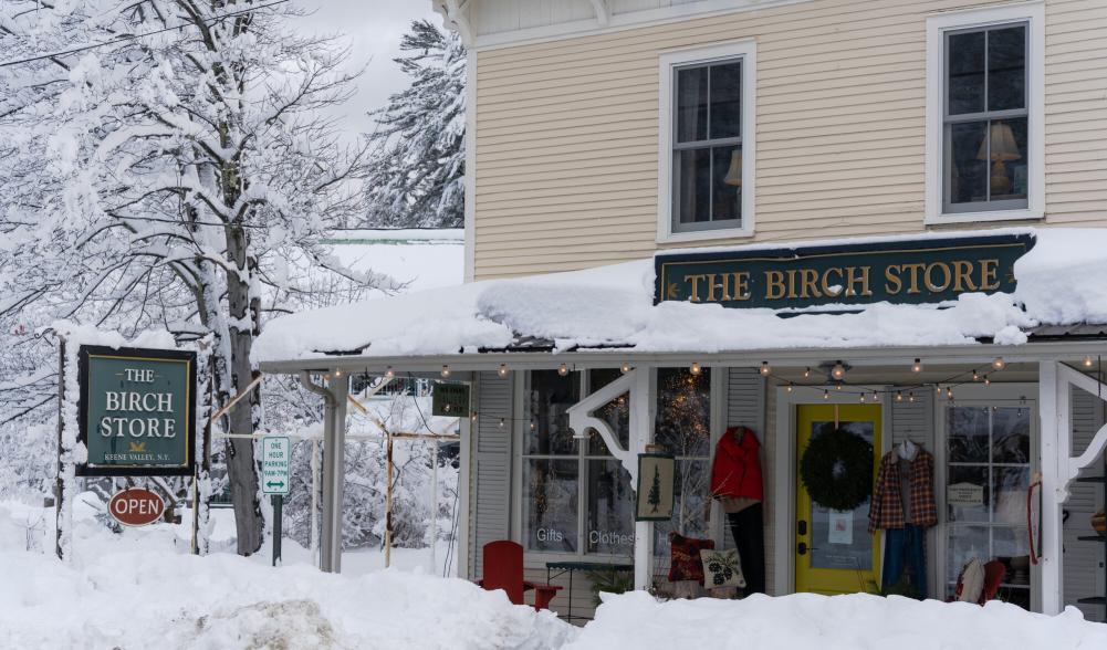 Exterior of Birch Store in winter covered in snow