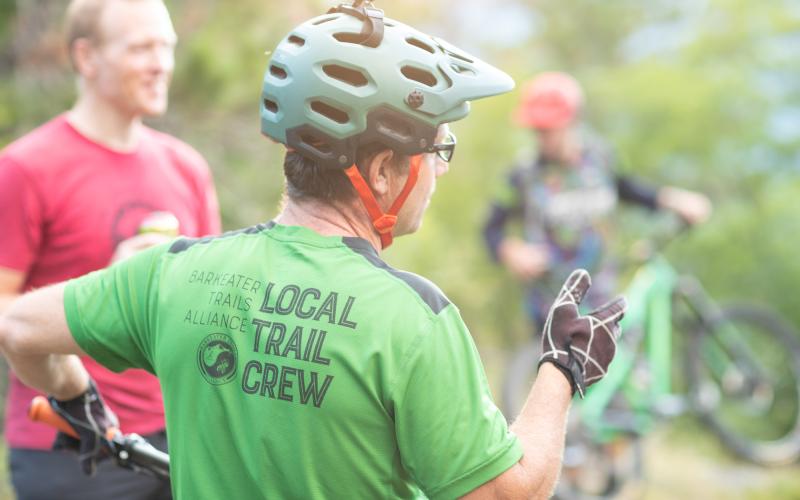 Trail crew chatting with people