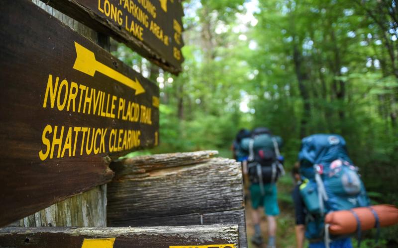 A trail sign that reads 