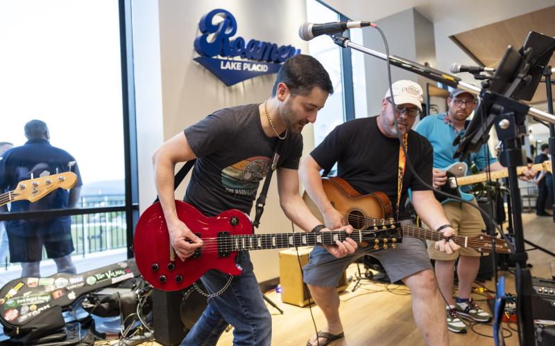 Band rocks the guitars on stage