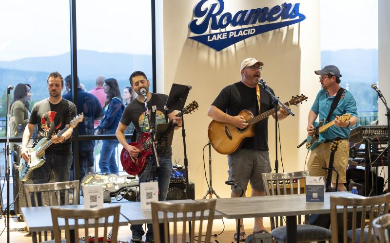 Band plays the stage with the mountain views as the backdrop