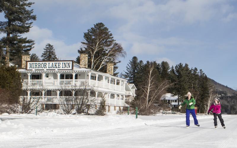 Skating on Mirror Lake in from of the Mirror Lake Inn