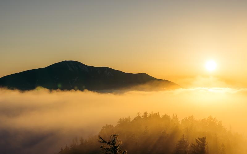 The sun rising over Giant Mountain.