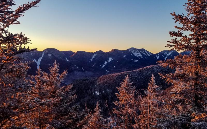 An early morning view of mountains in the winter