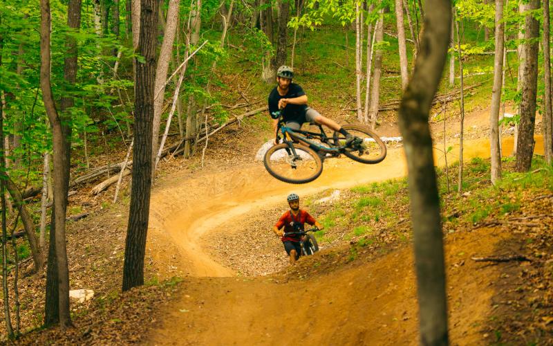 A mountain biker gets big air