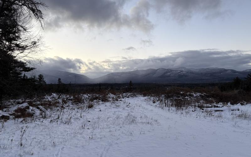 the high peaks stun from the wintery field