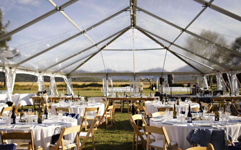 A clear tent allows the surrounding to be the decor