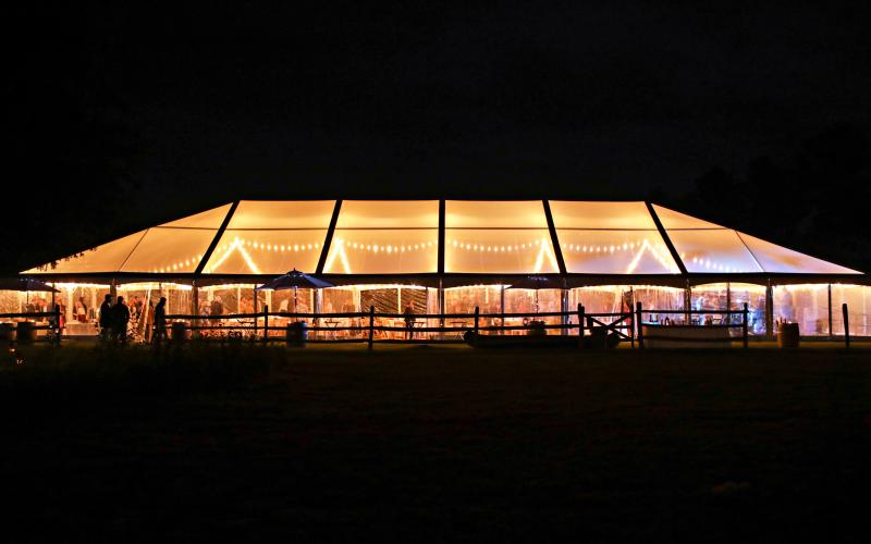 Clear tent glowing in the night